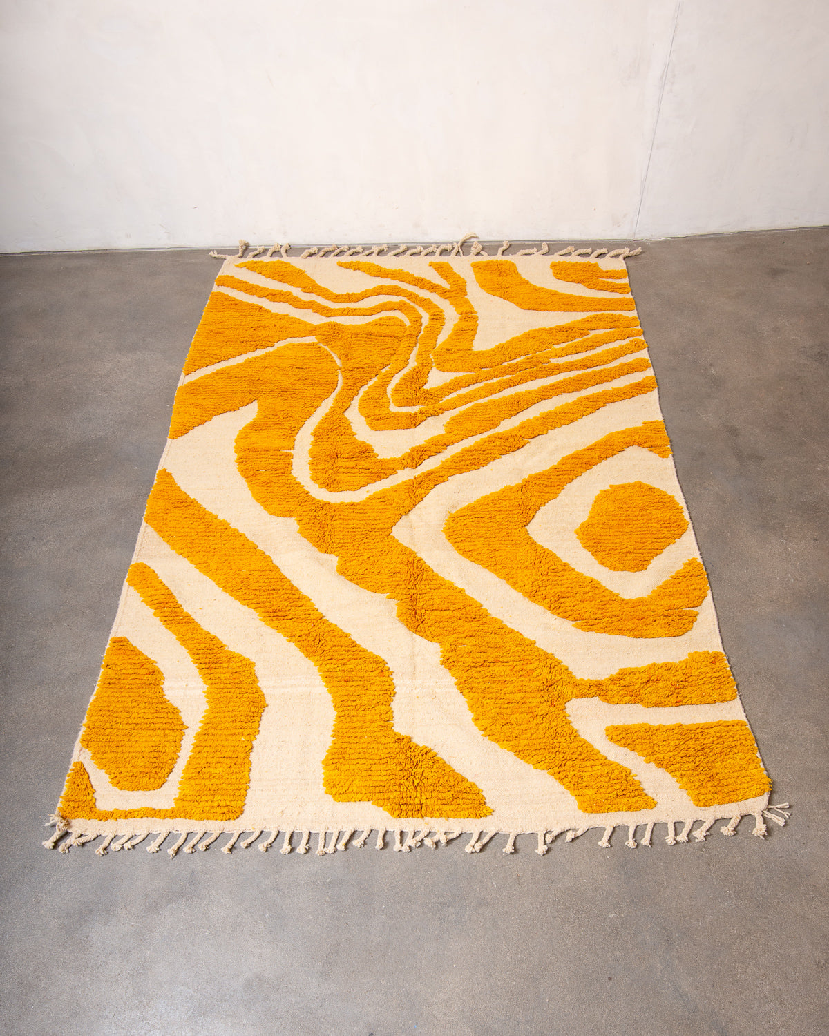 Modern, designer, handcrafted Berber rug from Morocco. Beniourain carpet with beautiful colours and patterns and fluffy wool texture.
